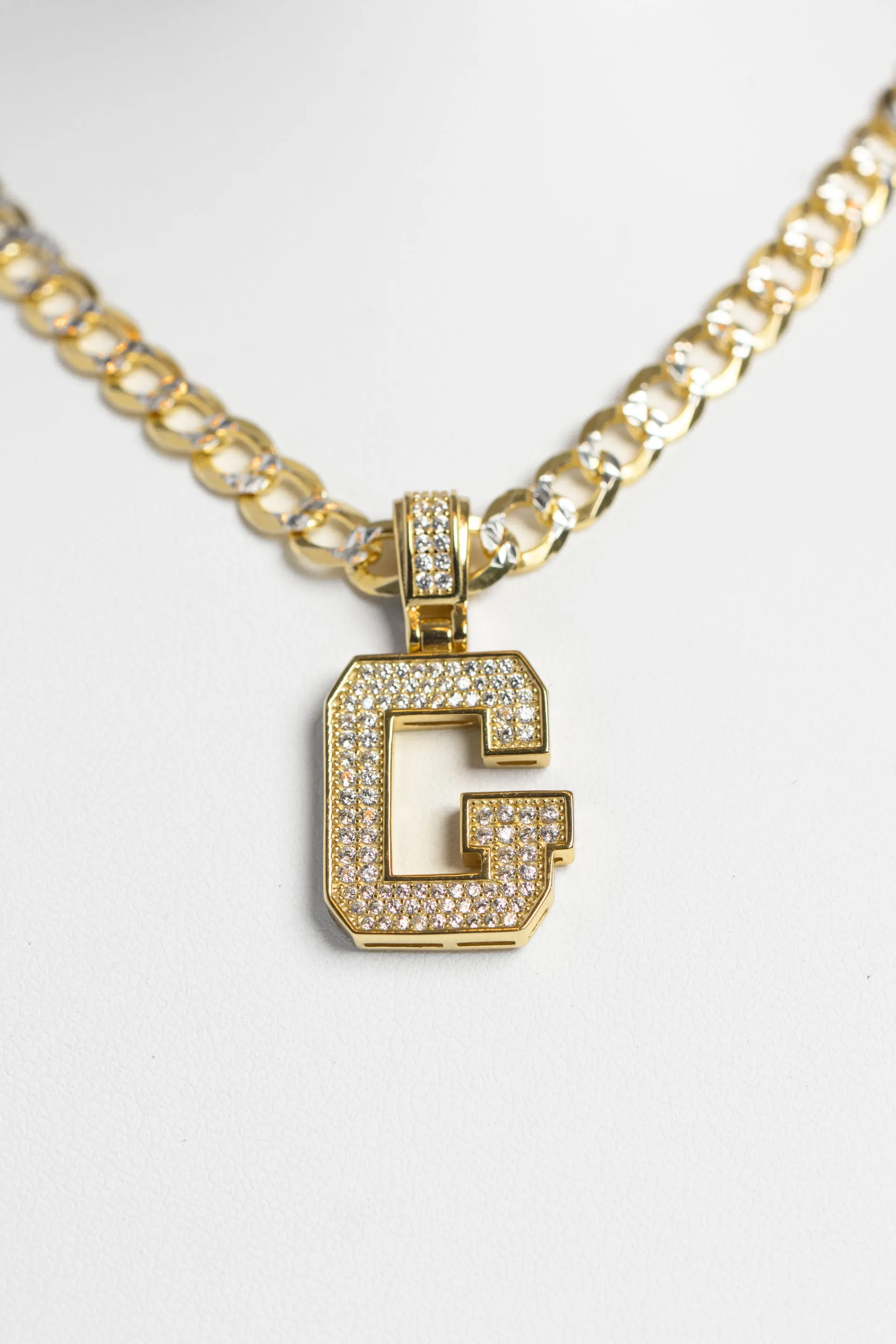 Cadena cubana con corte tipo diamante + letra G sport