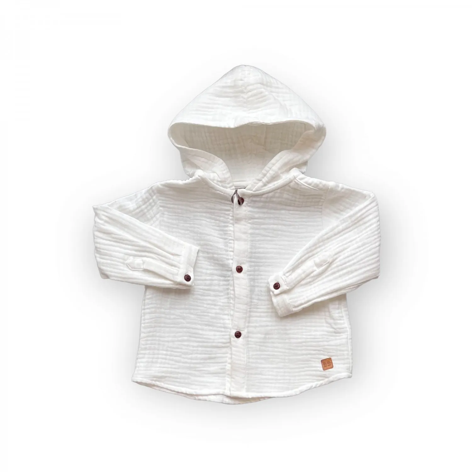 Camisa de bambula blanca para niño.
