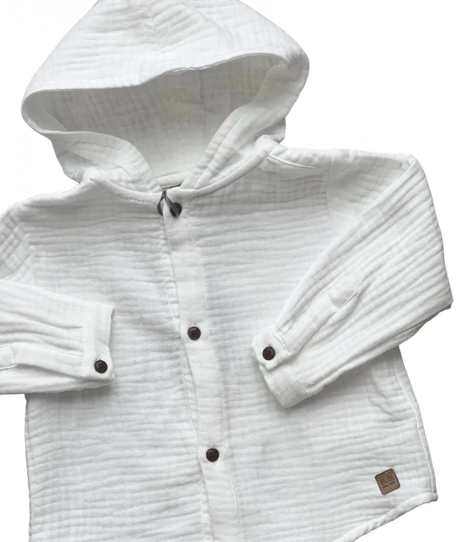 Camisa de bambula blanca para niño.