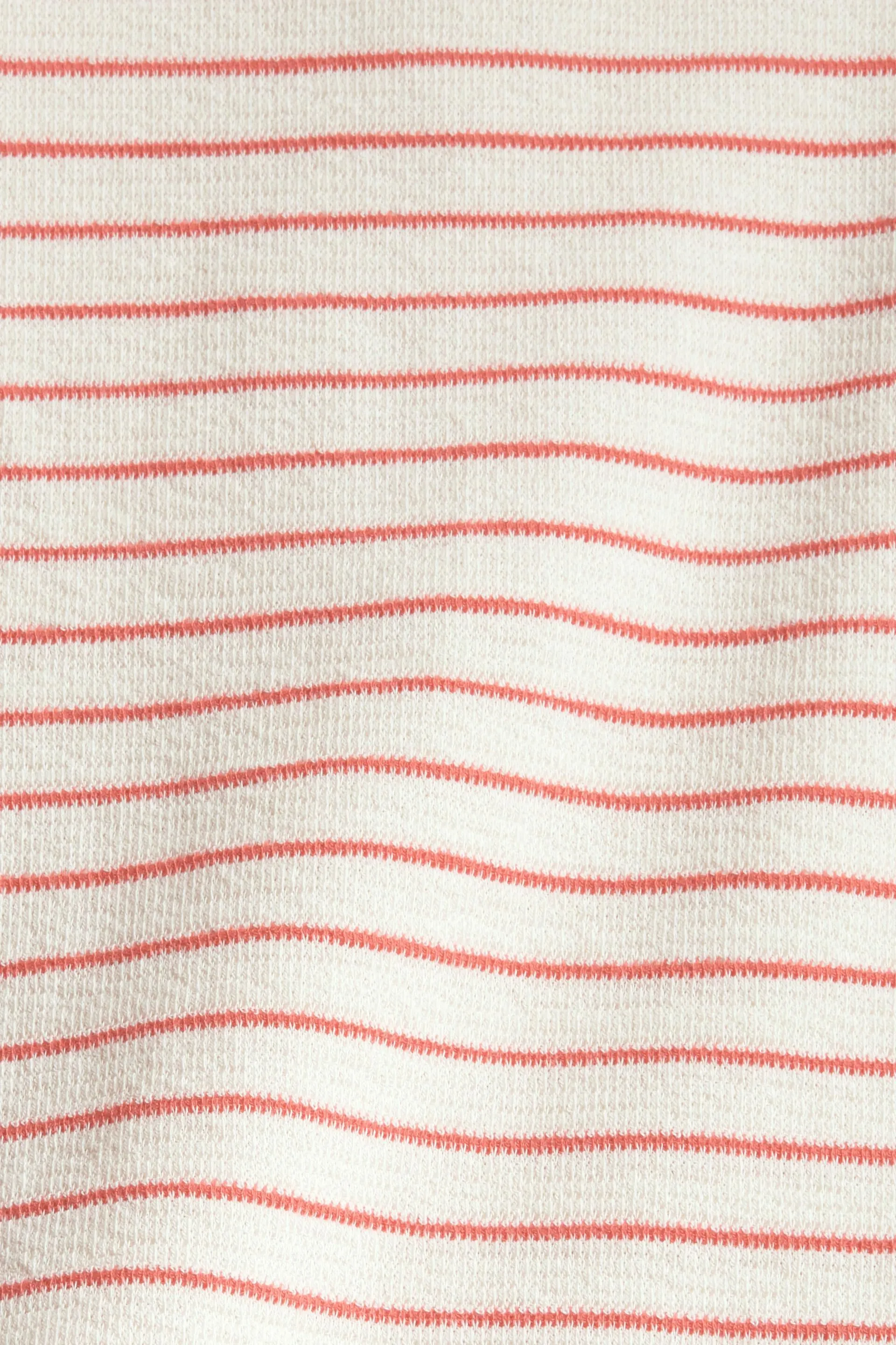 camiseta de manga larga con tira de botones