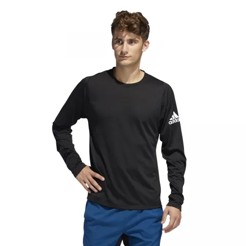 CAMISETA FREELIFT SPORT SOLID BADGE OF SPORT  DQ2846