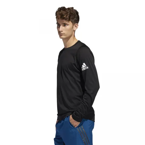 CAMISETA FREELIFT SPORT SOLID BADGE OF SPORT  DQ2846