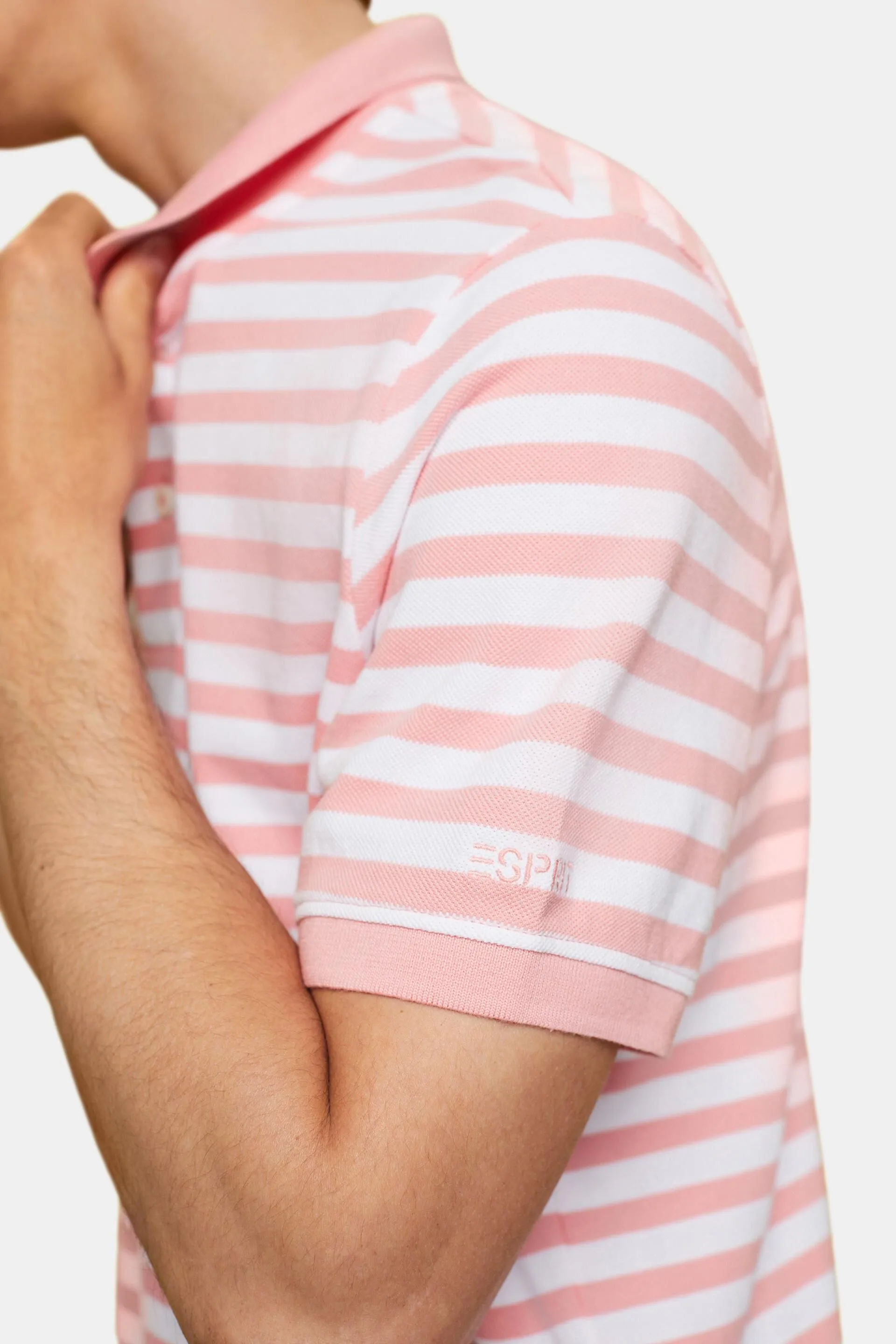 Polo de corte ceñido con rayas