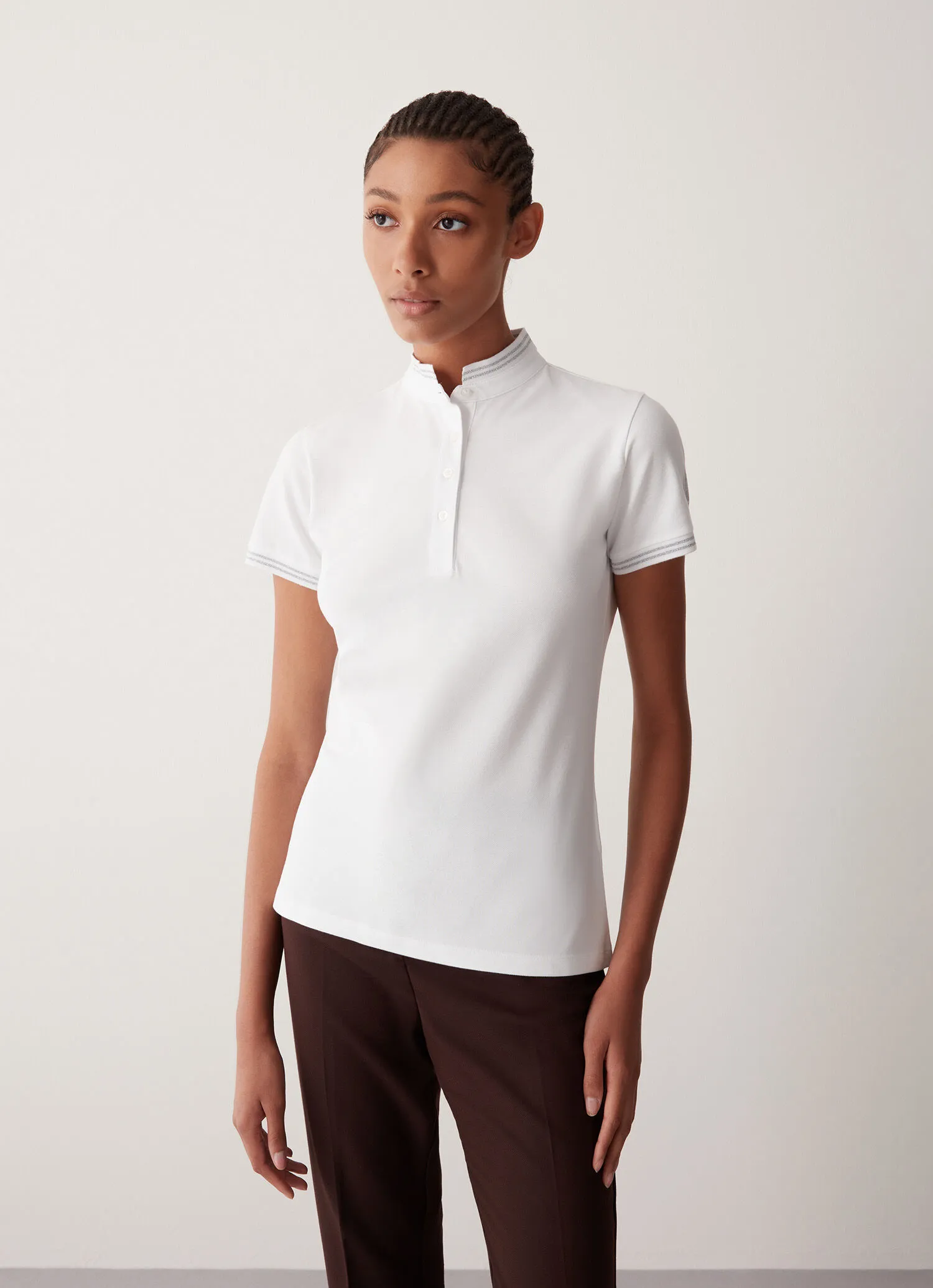 Polo de piqué elástico con cuello de punto canalé